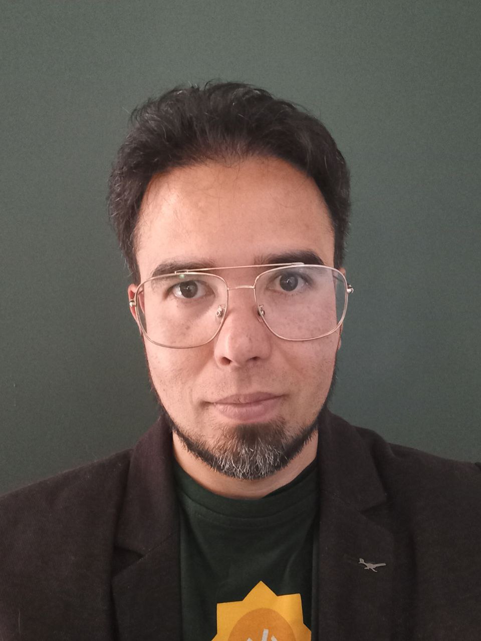 Ivan mentoring a small group at a whiteboard